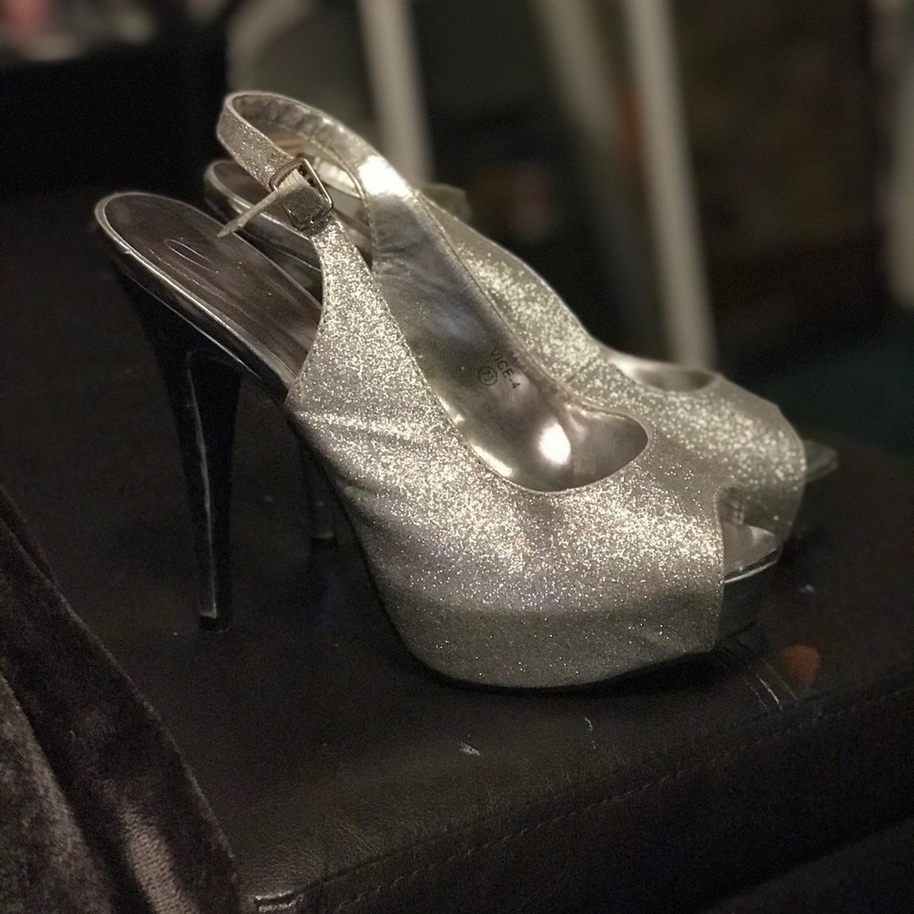 Silver heels with strap on the back